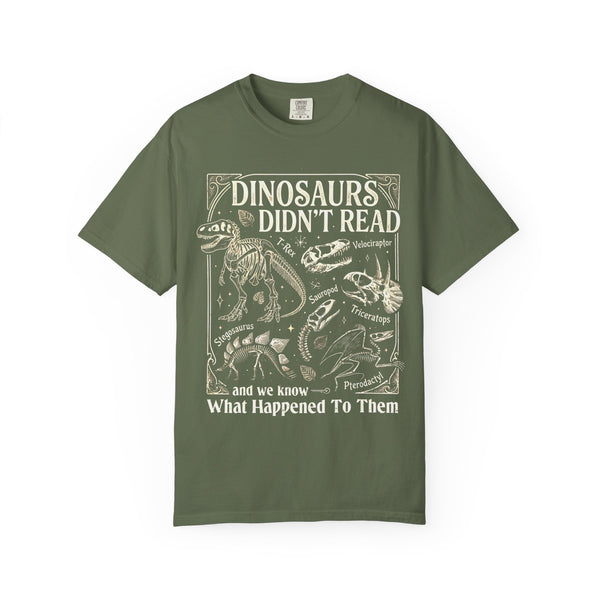 Comfort Colors t-shirt with dinosaur skeleton graphic and funny reading slogan “Dinosaurs Didn’t Read” for book lovers